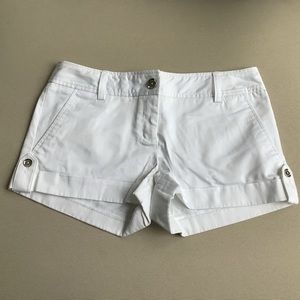 Express white shorts w silver button detail